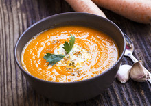 Creamy Carrot Soup With Cream Sauce On Top, Rustic Vegetable Soup In A Bowl