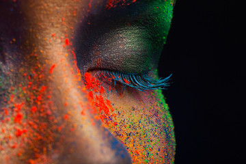 Wall Mural - Eye of model with colorful art make-up, close-up