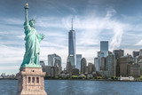 Fototapeta  - The statue of Liberty with World Trade Center background, Landmarks of New York City, USA