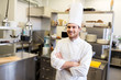 © Syda Productions - happy male chef cook at restaurant kitchen