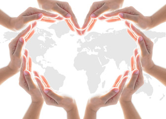 International cooperative, charity aid, friendship and world protection concept with heart collaborative hands