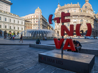 GENOA (GENOVA), ITALY - JULY, 6, 2017 - View of De Ferrari square in Genoa, the heart of the city with the central fountain.