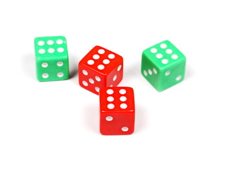 Red and green gambling dice isolated on white background