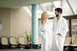© NDABCREATIVITY - Beautiful cheerful couple relaxing in spa center