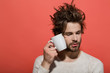 © Volodymyr - sleepy man with cup of tea or coffee