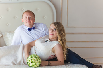 Wall Mural - Happy newlyweds near bride and groom