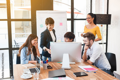 Fotografie, Tablou  group of five multi generation of creative work place, modern style of work, ent