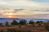 Fototapeta Sawanna - Beautiful sunset over peaceful nature landscape