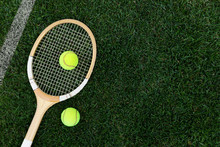 Retro Tennis Racket On Natural Grass With Balls. Top View With Copy Space