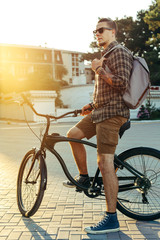 Wall Mural - Young Man Cyclist With Bicycle Resting  Daily Routine Lifestyle