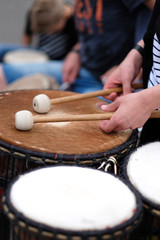 Wall Mural - A drummer with chopsticks behind a percussion set at a concert of percussion music.