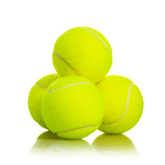 Pile of Tennis Balls sport equipment on white background with clipping path