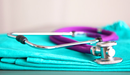 Stethoscope on a background of medical coat