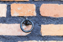 Round Iron Ring A Brick Wall