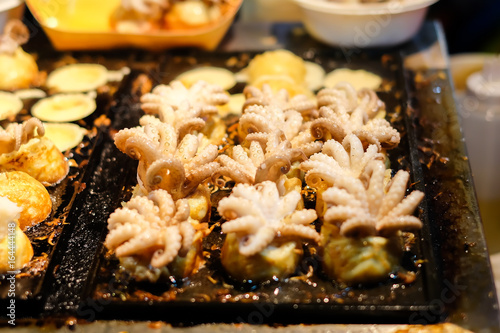 Homemade Baby Octopus In Takoyaki Japanese Balls On Black Stove For Japanese Food Background Or Texture Buy This Stock Photo And Explore Similar Images At Adobe Stock Adobe Stock Homemade Baby Octopus In Takoyaki Japanese Balls On Black Stove For Japanese Food Background Or Texture Buy This Stock Photo And Explore Similar Images At Adobe Stock Adobe Stock