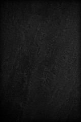 Dark grey black slate background or texture.