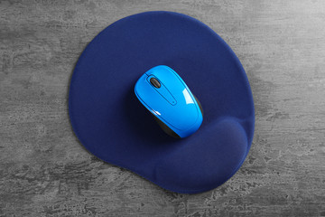 Sticker - Blank mat and wireless mouse on textured background