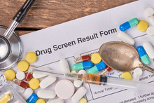 Drug Screen Result Form, Pills, Stethoscope. Medicine, Spoon, Stethoscope, Drug Screen Result Form. Abuse Of Drugs Harm For Life.