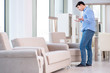 © Elnur - Young man shopping in furniture store