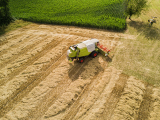 Sticker - Aerial view of combine harvester on field in Switzerland