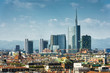 Milan skyline with modern skyscrapers on blue sky background, Italy