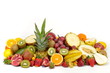 fresh tropical fruits against white background