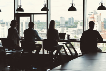 Aufkleber - Four youthful guys and ladies working in big office room