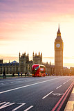 Fototapeta Londyn - The Big Ben, House of Parliament and double-decker bus blurred in motion, London, UK
