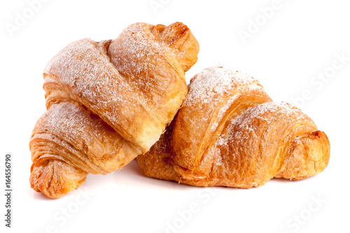 Fotomural two croissant sprinkled with powdered sugar isolated on a white background close