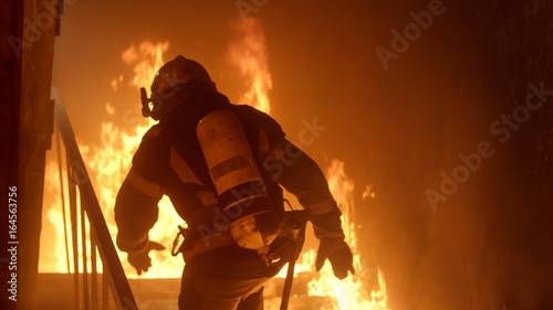 Brave Firefighter Runs Up The Stairs Poster Mural XXL