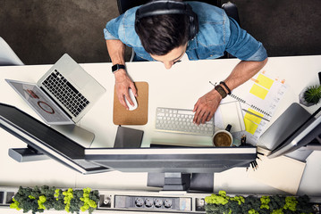 Poster - Male having job on computer in room