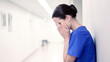 © Syda Productions - sad or crying female nurse at hospital corridor