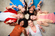 © Syda Productions - international group of happy women showing peace