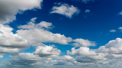 Wall Mural - time lapse clouds on blue sky