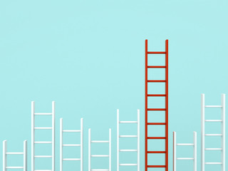 Fototapete - Stand out from the crowd and different creative idea concepts , Longest red ladder among other short white ladders on light green pastel color background . 3D rendering.