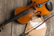 © fotofabrika - Sheet music and violin on wooden table
