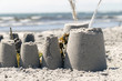 © perake - Ett sandslott vid stranden