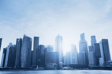 Wall Mural - business background, beautiful abstract blue cityscape with skyscrapers and copyspace