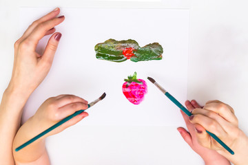 Wall Mural - Child's hands painting a flower