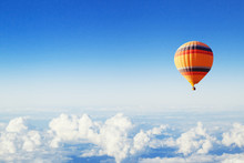 Inspiration Or Travel Background, Fly Above The Clouds, Colorful Hot Air Balloon In Blue Sky