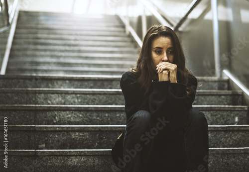 Fotomural Adult Woman Sitting Look Worried on The Stairway