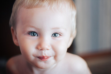 close up portrait of one year smiling boy