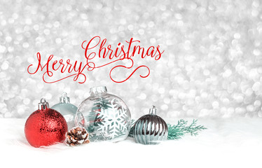 Aufkleber - red merry christmas over decoration ball on white fur at silver bokeh light background,holiday greet