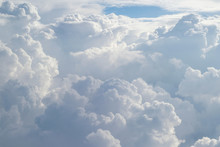 Aerial View From The Plane Of Fluffy Rain Cloud In Daytime - Cloudscape