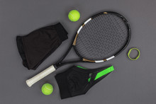 Top View Of Tennis Racquet And Balls, Sportswear And Fitness Tracker Isolated On Grey