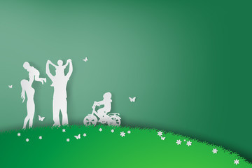 Green background happy family having fun playing in the field,vector,paper art style