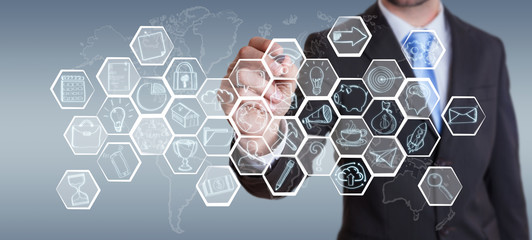 Businessman drawing multimedia hand-drawn interface