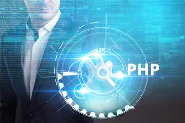 Business, Technology, Internet and network concept. Young businessman working on a virtual screen of the future and sees the inscription: PHP