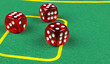 © Aleksei - risk concept - playing dice on a green gaming table. Playing a game with dice. Red casino dice rolls. Rolling the dice concept for business risk, chance, good luck or gambling