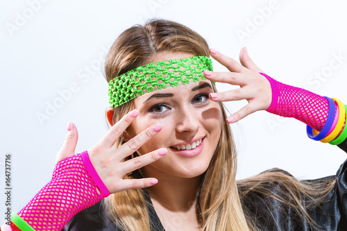 Woman in 1980's fashion on a white background
